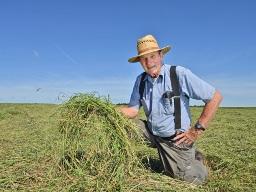 John Atkinson switched to bromegrass hay, a prized feed for horses, to appeal to horse owners in his area. (Progressive Farmer photo by Jim Patrico)